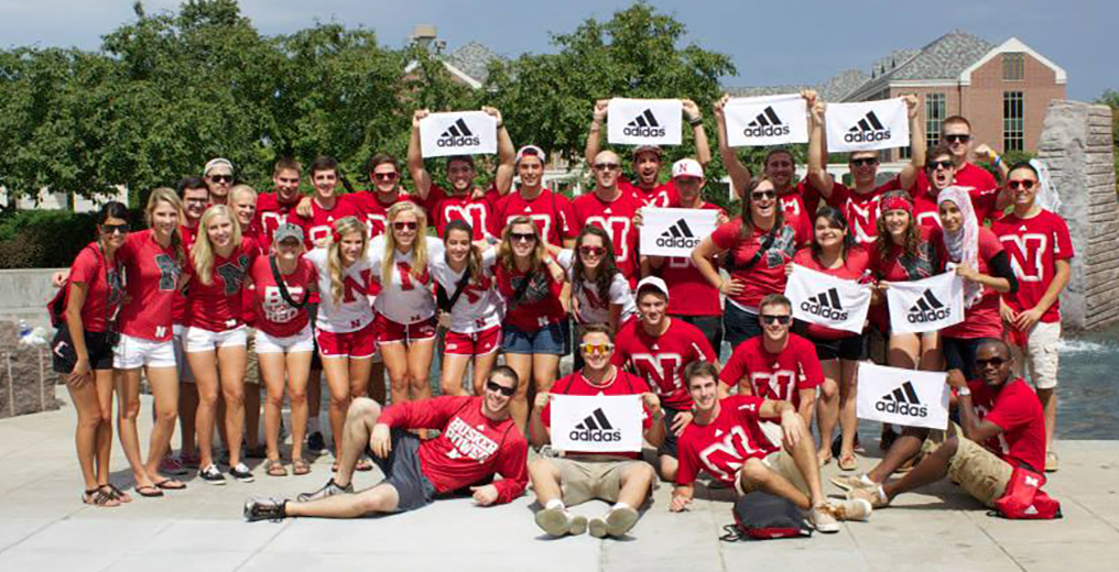 group of Gen Z students marketing Adidas on campus